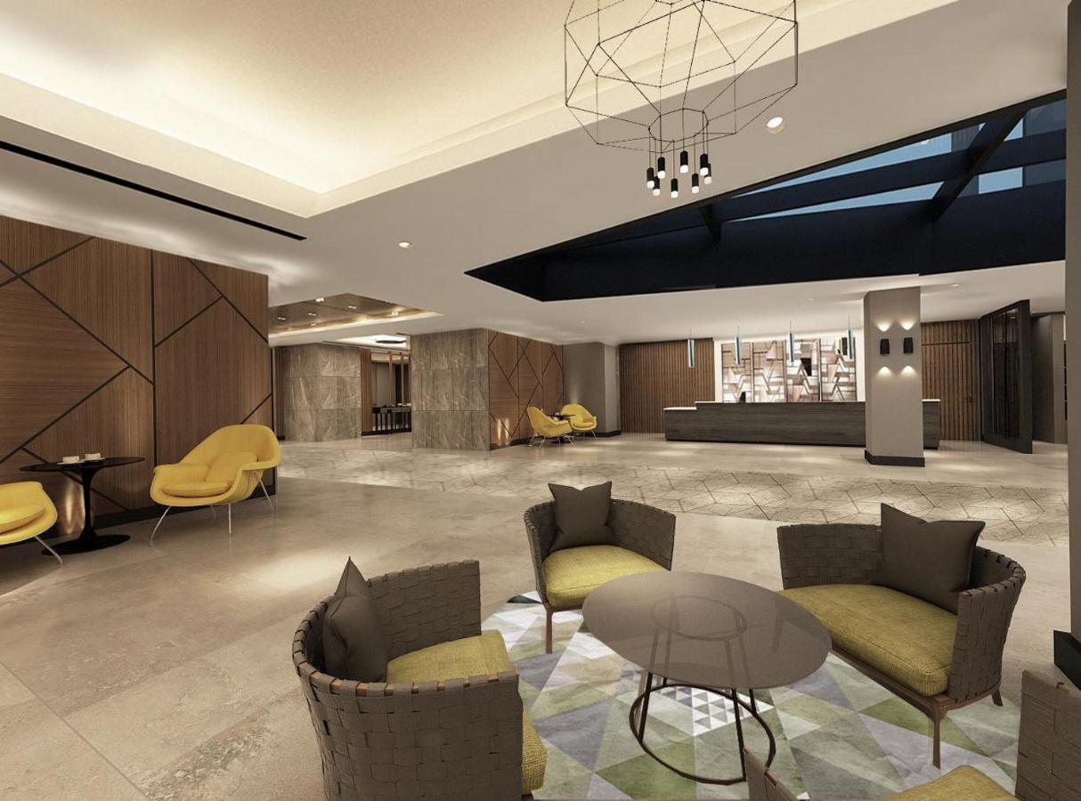 The Grand Lux Hotel ドーハ エクステリア 写真 The lobby of the hotel