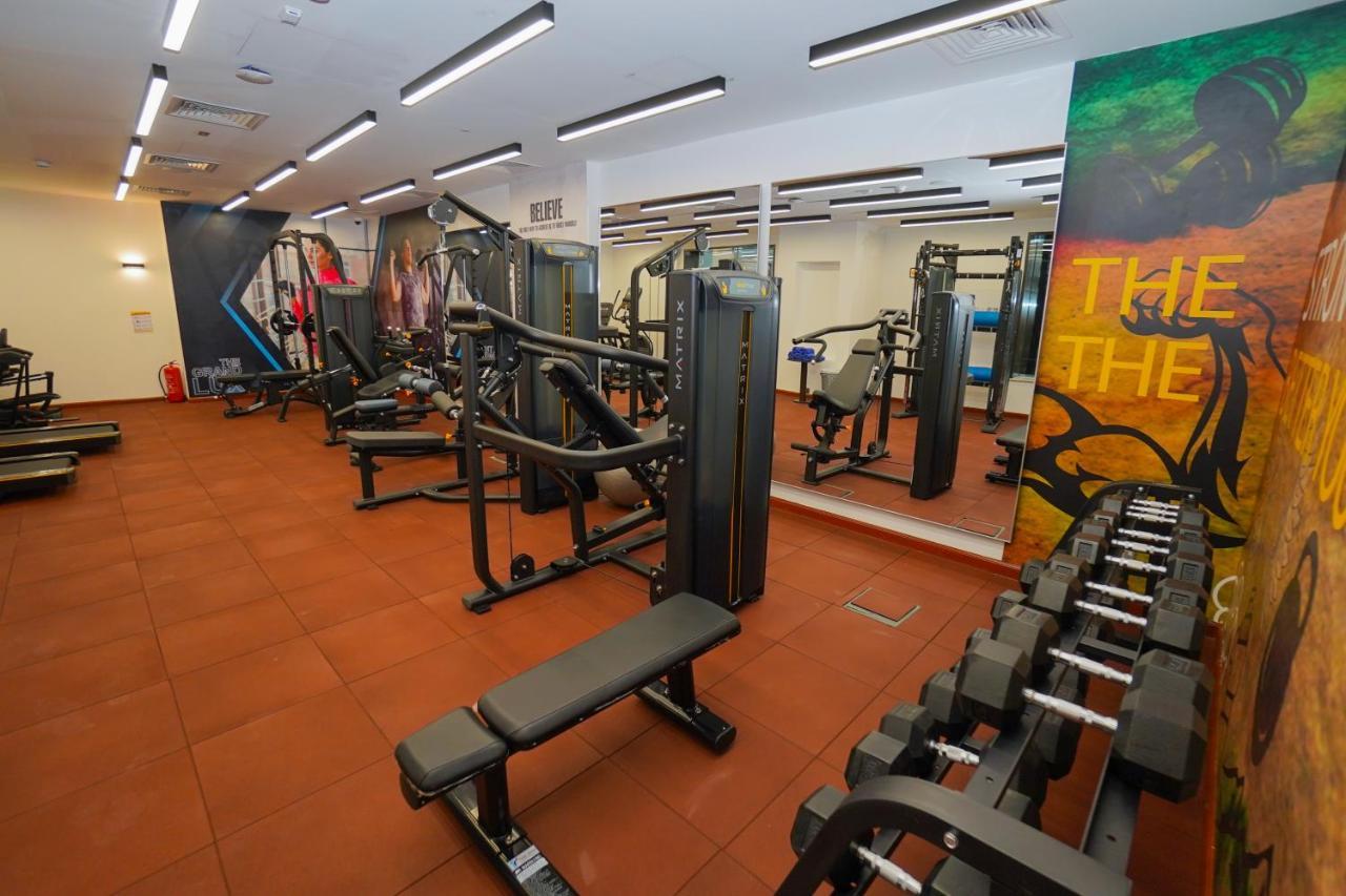The Grand Lux Hotel ドーハ エクステリア 写真 The gym at the hotel
