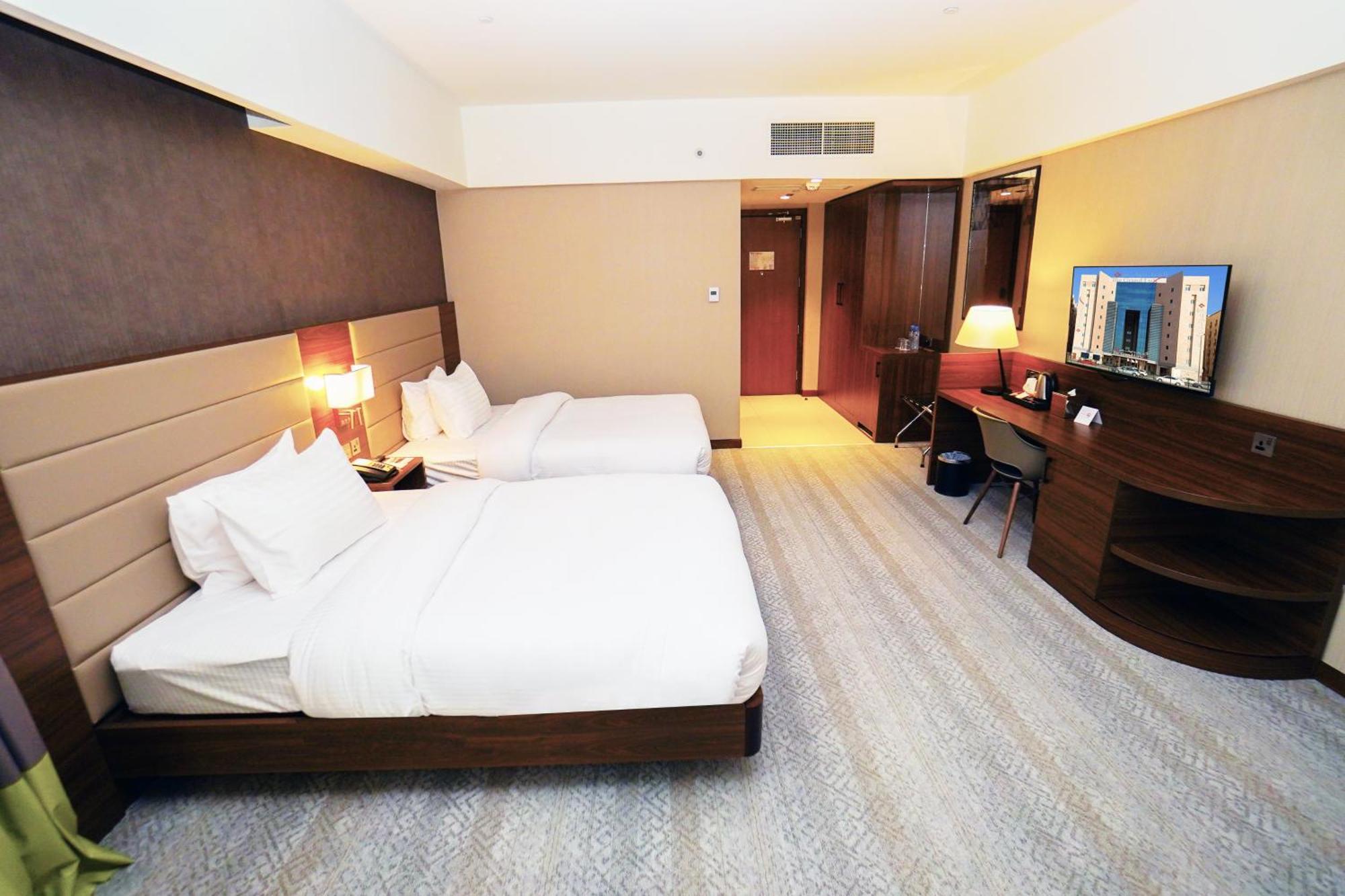The Grand Lux Hotel ドーハ エクステリア 写真 Deluxe Room